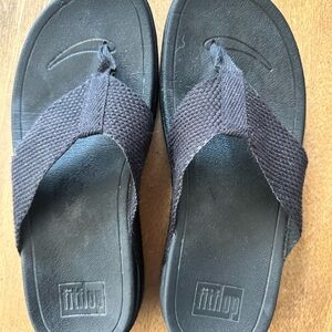 Gently used flip flops.